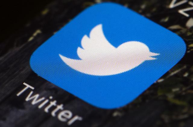 FILE - A Twitter app icon on a mobile phone is displayed in Philadelphia, U.S.A., April 26, 2017. Elon Musk plans to change the logo of Twitter to an “X” from the bird, marking what would be the latest big change since he bought the social media platform for $44 billion last year. (AP Photo/Matt Rourke, File)