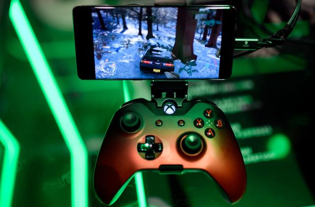 A cloud-based console is displayed at the Microsoft Xbox stand during the Video games trade fair Gamescom in Cologne, western Germany, on August 21, 2019. (Photo by Ina FASSBENDER / AFP)        (Photo credit should read INA FASSBENDER/AFP via Getty Images)