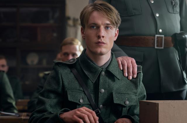 Screenscap from Netflix's upcoming World War II drama, All The Light We Cannot See. Louis Hofmann stars as German soldier Werner Pfennig.   
