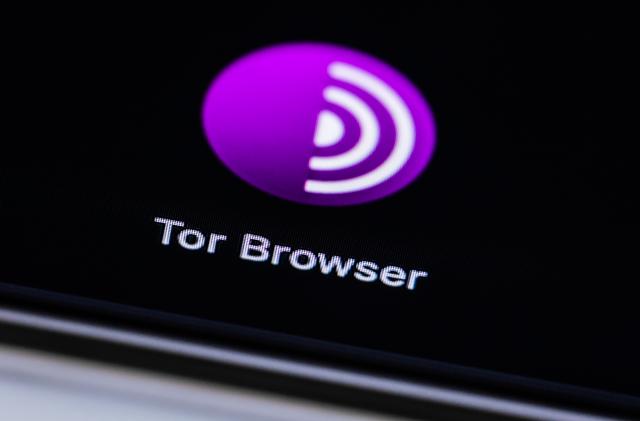 10 December 2021, Baden-Wuerttemberg, Rottweil: The Tor Browser lettering is seen on the display of a MacBook. Photo: Silas Stein/ (Photo by Silas Stein/picture alliance via Getty Images)