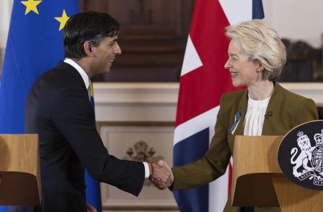 FILE - Britain's Prime Minister Rishi Sunak and EU Commission President Ursula von der Leyen, right, shake hands after a press conference at Windsor Guildhall, Windsor, England, Monday Feb. 27, 2023. Britain is rejoining the European Union’s science-sharing program Horizon Europe. The news announced Thursday, Sept. 7, 2023 comes more than two years after Britain's membership became a casualty of Brexit.(Dan Kitwood/Pool via AP, File)