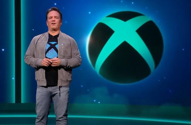 Microsoft Gaming CEO Phil Spencer and the Xbox logo