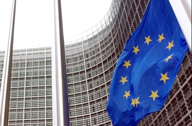 European Union flag waving outside European Commission headquarters, Brussels, Belgium, photo