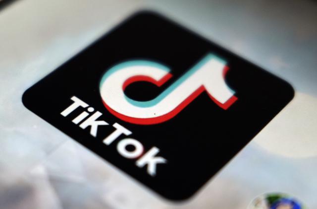 FILE - The TikTok app logo, in Tokyo, on Sept. 28, 2020. TikTok needs to do more to get ready for new European Union digital rules designed to keep users safe online, a top official said Tuesday July 18, 2023. (AP Photo/Kiichiro Sato, File)