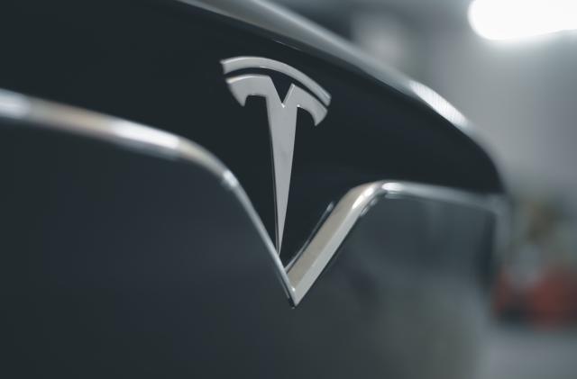 An image of the front of a Tesla. 