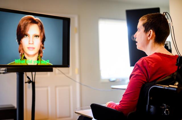 Ann, a participant in Dr. Eddie Changâs study of speech neuroprostheses, uses a digital link wired to her cortex to interface with an avatar on Monday, May 22, 2023, in El Cerrito, Calif. (Photo by Noah Berger)