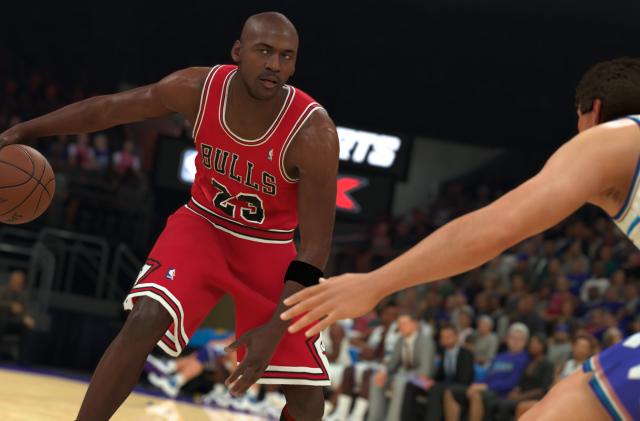 A computer-generated version of Michael Jordan wears a Chicago Bulls uniform and dribbles a basketball on the court in NBA 2K23.